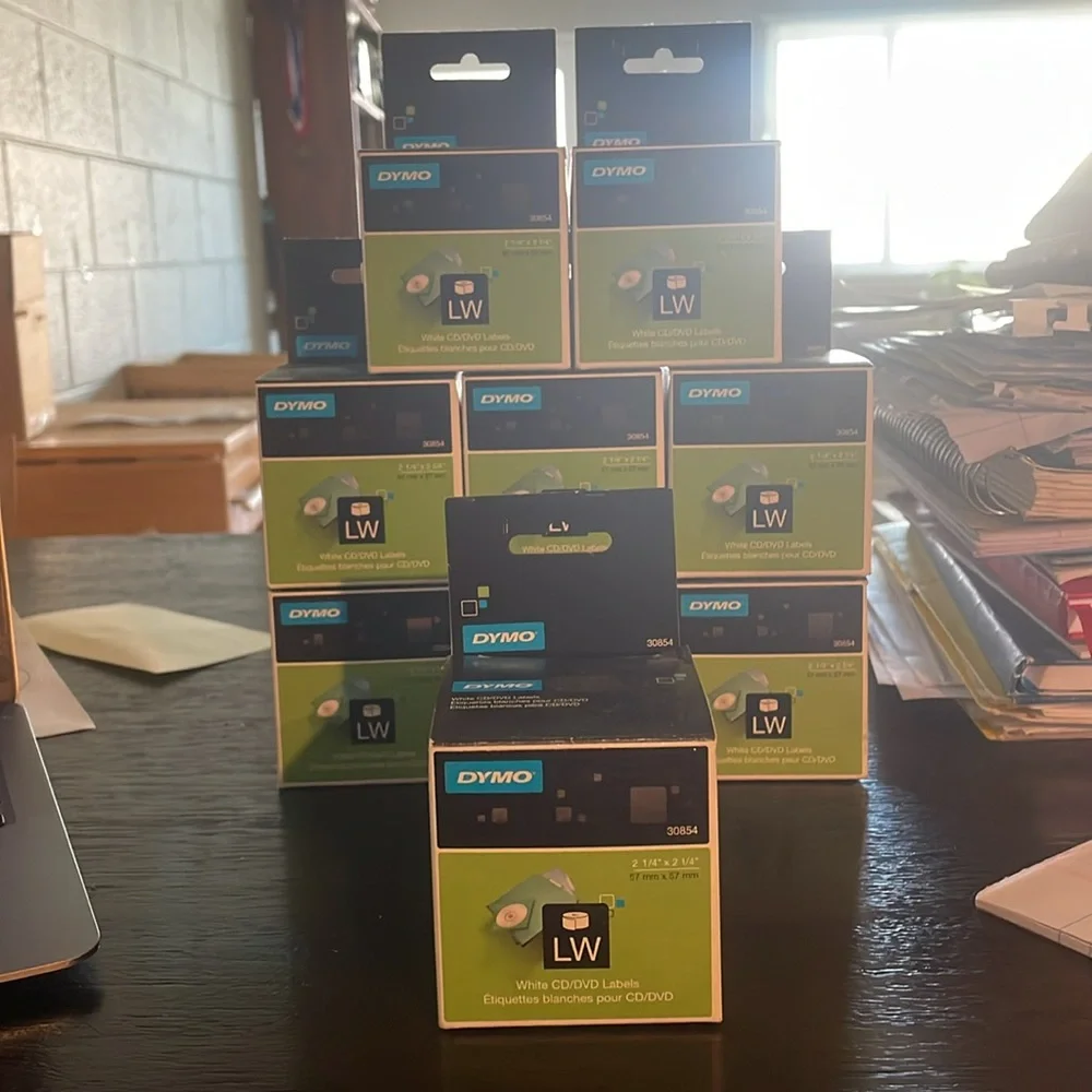 9, new in box, Dymo CD / DVD labels. Each roll has 160 labels